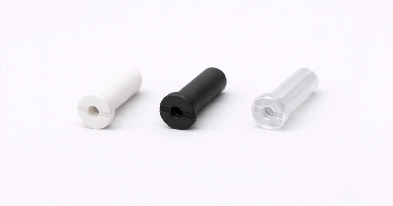 viti in plastica bianca, nera, trasparente con foro passante.